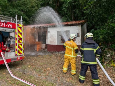 10月22日森林火災實地演練,高雄市政府消防局第六大隊配合佈防於民房，防範民宅受災演練情形